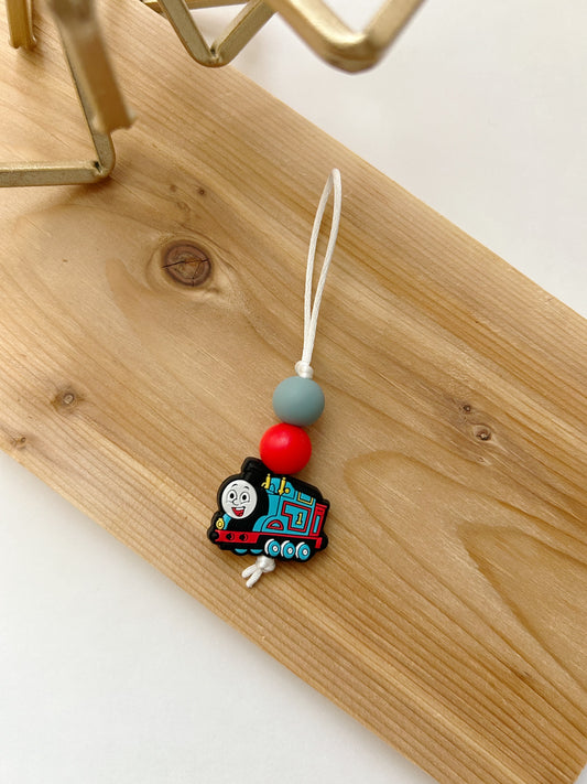TRAIN // ZIPPER PULLS